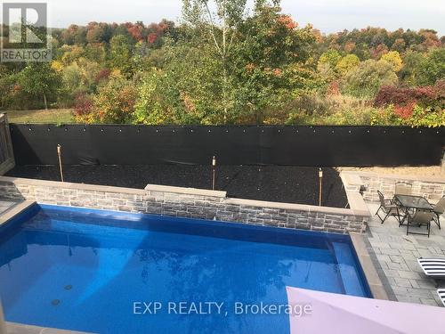 54 Gentle Fox Drive, Caledon, ON - Outdoor With In Ground Pool
