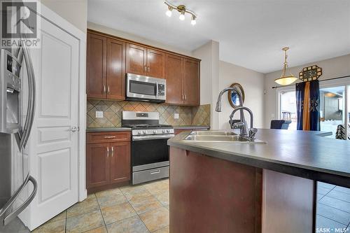 4625 Padwick Road, Regina, SK - Indoor Photo Showing Kitchen With Double Sink