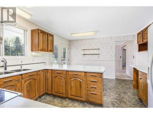 509 Crestview Drive, Coldstream, BC - Indoor Photo Showing Kitchen With Double Sink