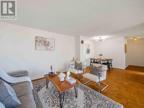 1010 - 3695 Kaneff Crescent, Mississauga, ON - Indoor Photo Showing Living Room