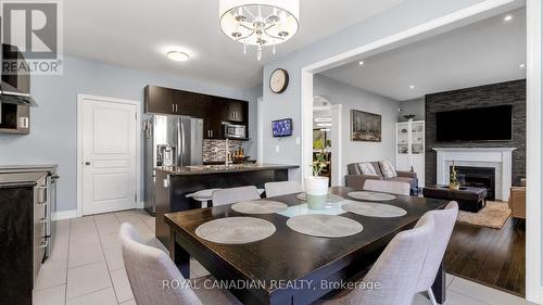 39 Orangeblossom Trail, Brampton (Credit Valley), ON - Indoor Photo Showing Dining Room With Fireplace