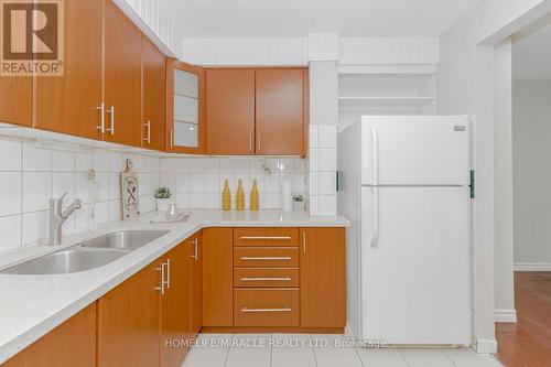 1 - 7450 Darcel Avenue, Mississauga, ON - Indoor Photo Showing Kitchen With Double Sink