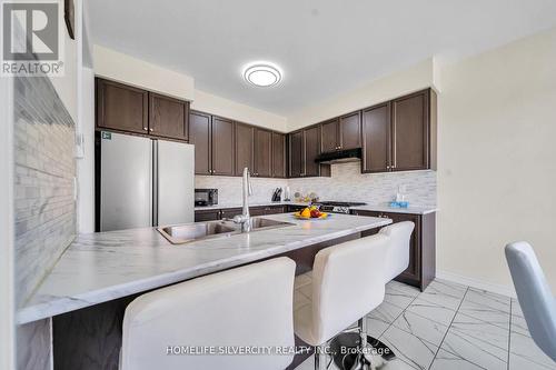 16 Cahill Drive, Brantford, ON - Indoor Photo Showing Kitchen With Double Sink