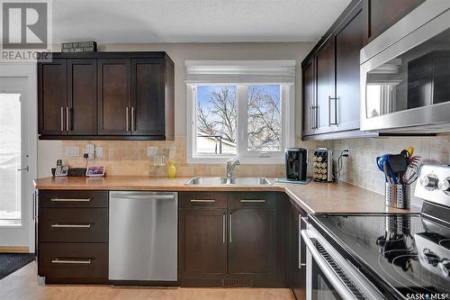 34 Markwell Drive, Regina, SK - Indoor Photo Showing Kitchen With Stainless Steel Kitchen With Double Sink