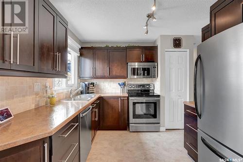 34 Markwell Drive, Regina, SK - Indoor Photo Showing Kitchen With Stainless Steel Kitchen With Double Sink