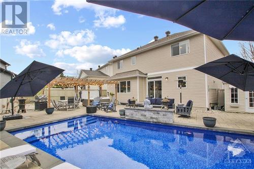 4 Pelee Street, Kanata, ON - Outdoor With In Ground Pool With Deck Patio Veranda