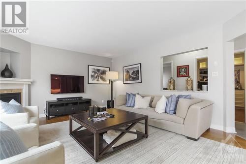 4 Pelee Street, Kanata, ON - Indoor Photo Showing Living Room With Fireplace