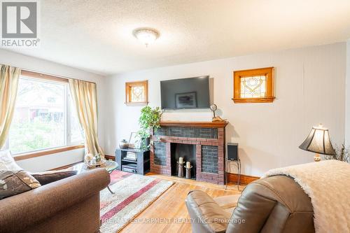 90 Graham Avenue S, Hamilton, ON - Indoor Photo Showing Living Room With Fireplace