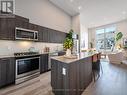 11 - 169 Jones Avenue, Toronto, ON  - Indoor Photo Showing Kitchen With Stainless Steel Kitchen With Upgraded Kitchen 