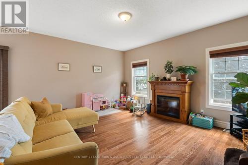 17 Rosemary Court, Prince Edward County, ON - Indoor Photo Showing Living Room With Fireplace