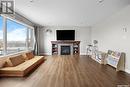 4505 Padwick Avenue, Regina, SK  - Indoor Photo Showing Living Room With Fireplace 