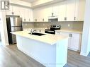 11 Verbena Street, East Gwillimbury, ON  - Indoor Photo Showing Kitchen With Double Sink 