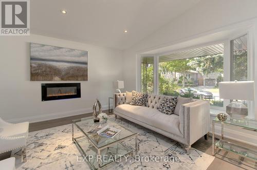 1424 Strathy Avenue, Mississauga, ON - Indoor Photo Showing Living Room With Fireplace