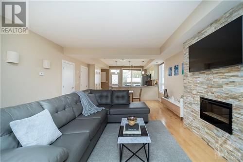 60 Meach Private Unit#104, Stittsville, ON - Indoor Photo Showing Living Room With Fireplace