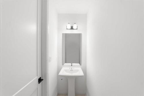 MAIN FLOOR POWDERROOM - 23 Mair Avenue E, Brantford, ON - Indoor Photo Showing Bathroom