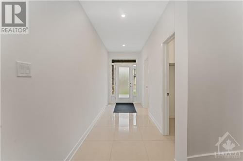 Foyer with upgraded tile - 723 Odyssey Way, Ottawa, ON - Indoor Photo Showing Other Room