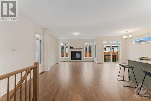 Main floor with gleaming hardwood flooring - 723 Odyssey Way, Ottawa, ON - Indoor Photo Showing Living Room