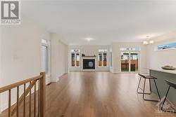 Main floor with gleaming hardwood flooring - 