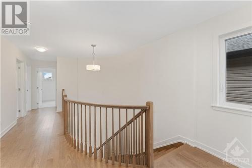 Hardwood flooring in upper hallway - 723 Odyssey Way, Ottawa, ON - Indoor Photo Showing Other Room