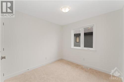 Bedroom with upgraded carpet - 723 Odyssey Way, Ottawa, ON - Indoor Photo Showing Other Room