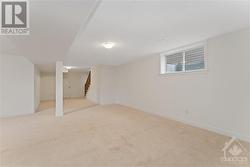 Finished basement with large window for natural light - 