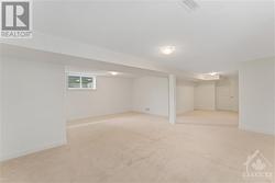 Finished basement area with upgraded carpet - 