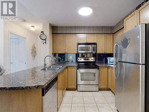 506 - 1863 Queen Street E, Toronto, ON - Indoor Photo Showing Kitchen With Stainless Steel Kitchen With Double Sink