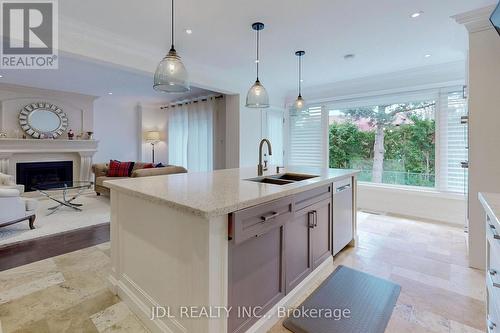 327 Mckee Avenue, Toronto, ON - Indoor Photo Showing Kitchen With Fireplace With Double Sink