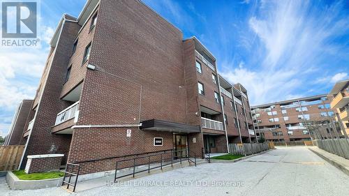 524 - 4060 Lawrence Avenue E, Toronto, ON - Outdoor With Exterior