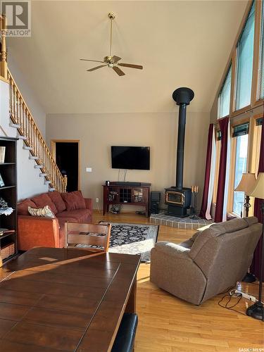 8 Chandler Crescent, Cymri Rm No. 36, SK - Indoor Photo Showing Living Room With Fireplace