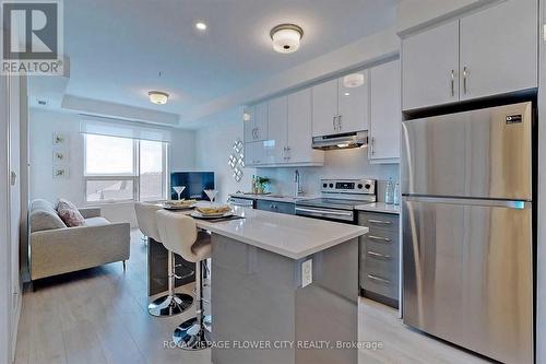 407 - 1105 Leger Way, Milton, ON - Indoor Photo Showing Kitchen With Stainless Steel Kitchen