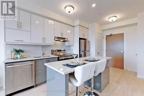 407 - 1105 Leger Way, Milton, ON - Indoor Photo Showing Kitchen With Stainless Steel Kitchen