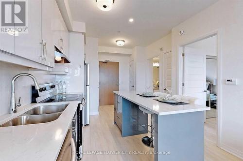 407 - 1105 Leger Way, Milton, ON - Indoor Photo Showing Kitchen With Double Sink