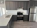85 Sagewood Avenue, Barrie, ON  - Indoor Photo Showing Kitchen With Stainless Steel Kitchen With Double Sink 