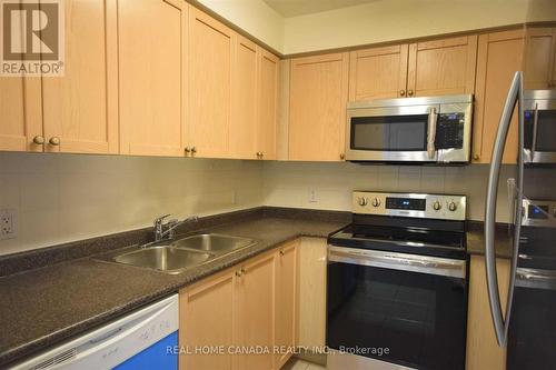 1504 - 4879 Kimbermount Avenue, Mississauga, ON - Indoor Photo Showing Kitchen With Double Sink