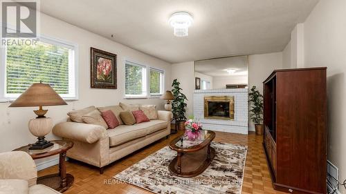 16 Claypine Trail, Brampton, ON - Indoor Photo Showing Living Room With Fireplace