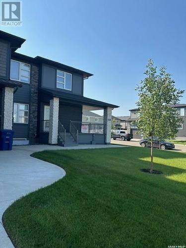 22 254 Brighton Gate, Saskatoon, SK - Outdoor With Deck Patio Veranda