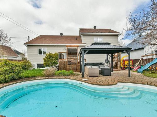 Backyard - 6945 Rue Du Hêtre, Terrebonne (La Plaine), QC - Outdoor With In Ground Pool