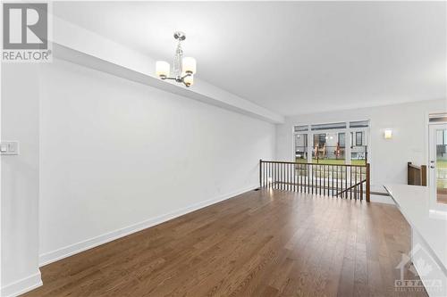 Hardwood floors in the living and dining area - 623 Rathburn Lane, Ottawa, ON - Indoor Photo Showing Other Room