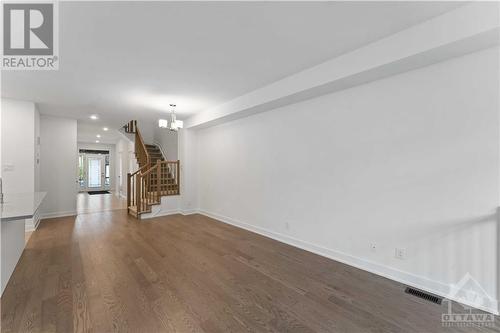 Main floor, with upgraded hardwood floors - 623 Rathburn Lane, Ottawa, ON - Indoor Photo Showing Other Room