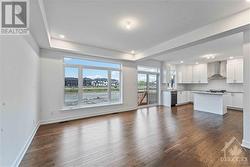 Large window in Family room allowing natural light to flow into the house - 