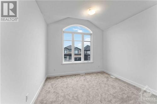 2nd floor loft with large window for natural light - 705 Rosales Ridge, Ottawa, ON - Indoor Photo Showing Other Room