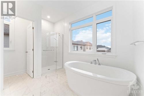Primary ensuite, stand alone tub and ceramic/glass shower - 525 Tahoe Heights, Ottawa, ON - Indoor Photo Showing Bathroom