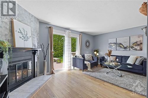 5 Berkshire Way, Ottawa, ON - Indoor Photo Showing Living Room With Fireplace