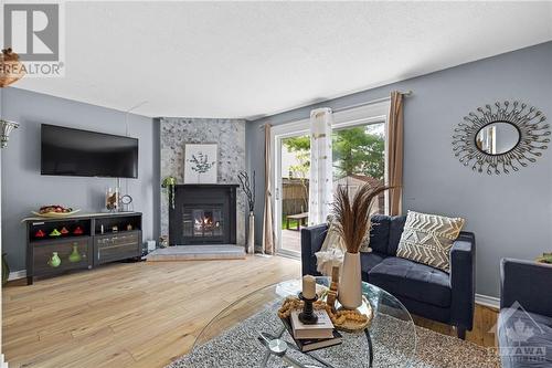 5 Berkshire Way, Ottawa, ON - Indoor Photo Showing Living Room With Fireplace