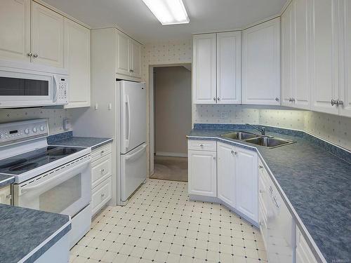 203-1440 Beach Dr, Oak Bay, BC - Indoor Photo Showing Kitchen With Double Sink