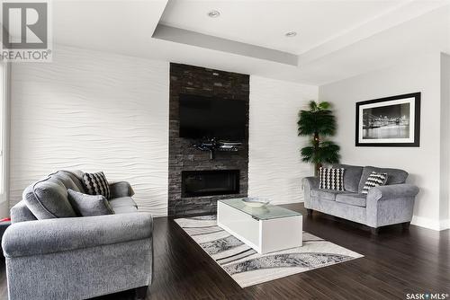 5281 Aviator Crescent, Regina, SK - Indoor Photo Showing Living Room With Fireplace