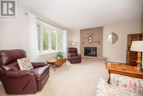 86 Pinewood Place, Deep River, ON - Indoor Photo Showing Living Room With Fireplace