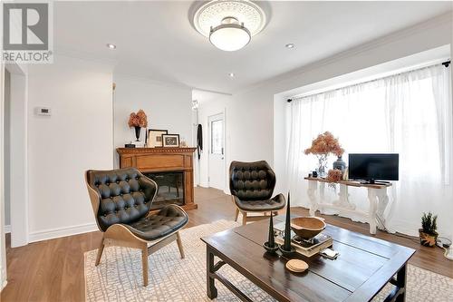 83 Harry Street, Renfrew, ON - Indoor Photo Showing Living Room With Fireplace