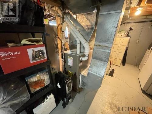 49 Niven St, Temiskaming Shores, ON - Indoor Photo Showing Basement With Fireplace